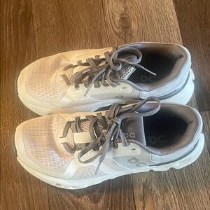On Running Cream and Gray Athletic Shoes